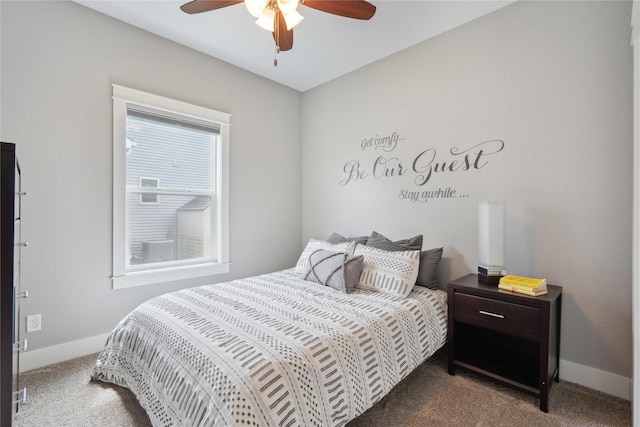 bedroom with carpet floors, baseboards, and ceiling fan