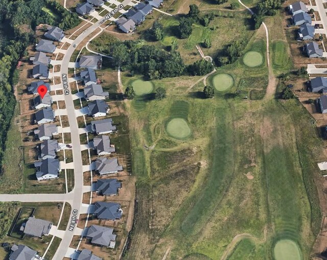 6398 NE 8th Ct, Des Moines, IA 50313 - birds eye view of property with view of golf course and a residential view
