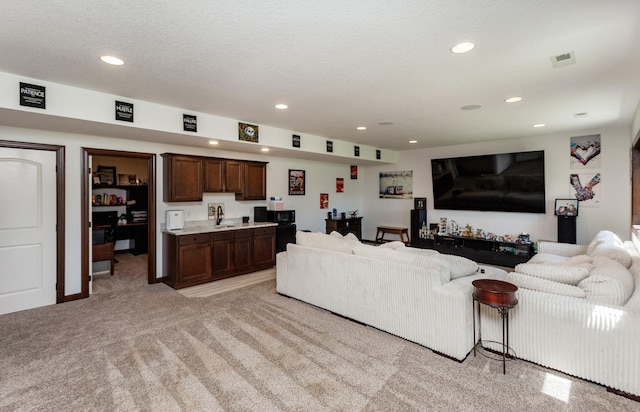 218 34th St SE, Altoona, IA 50009 - living area with light colored carpet and recessed lighting