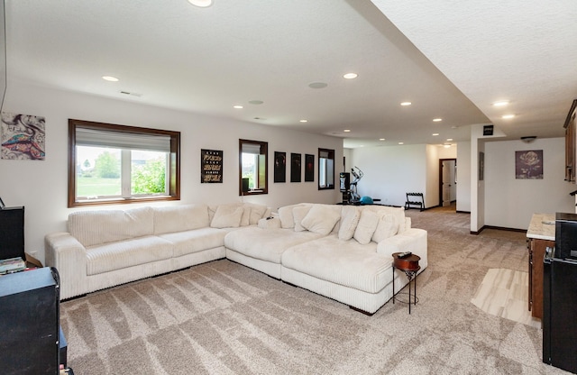 218 34th St SE, Altoona, IA 50009 - living room featuring light carpet and recessed lighting