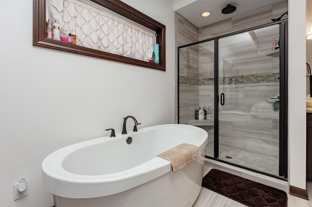 218 34th St SE, Altoona, IA 50009 - full bath with a shower stall and a soaking tub