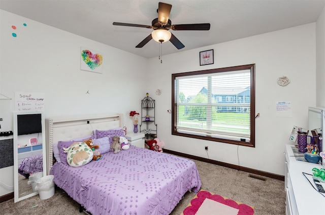 218 34th St SE, Altoona, IA 50009 - bedroom featuring carpet flooring, baseboards, and ceiling fan