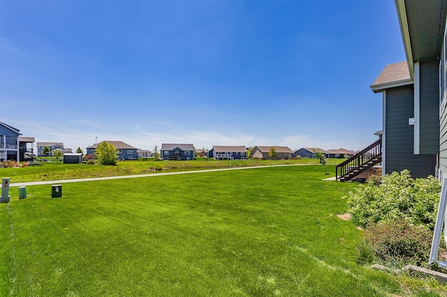218 34th St SE, Altoona, IA 50009 - view of green lawn featuring a residential view and stairs