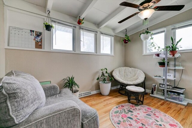 4132 69th St, Urbandale, IA 50322 - sitting room featuring wood finished floors, ceiling fan, and baseboards