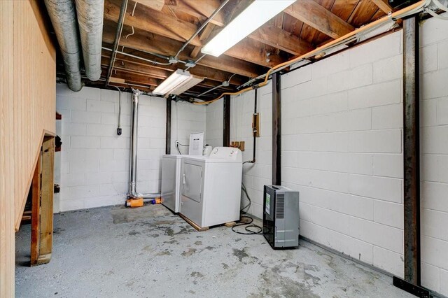 4132 69th St, Urbandale, IA 50322 - unfinished basement with washer and clothes dryer and concrete block wall