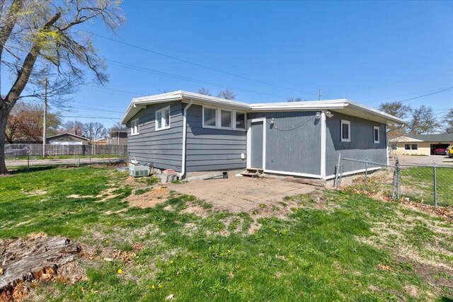 4132 69th St, Urbandale, IA 50322 - rear view of property featuring cooling unit