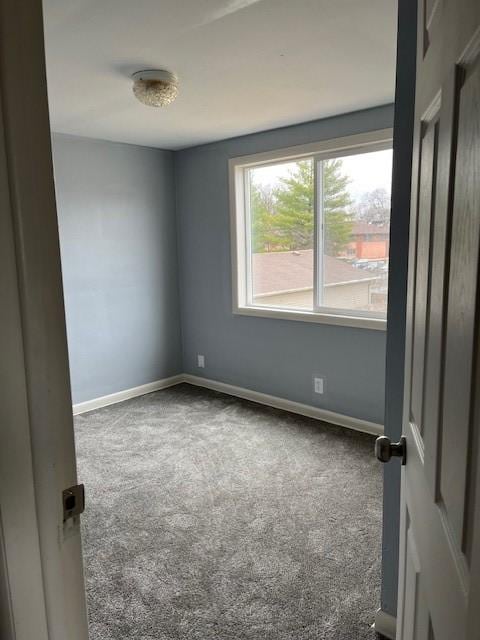 4111 Allison Ave, Des Moines, IA 50310 - spare room featuring baseboards and carpet