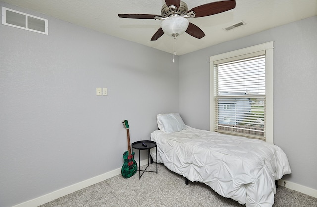 1009 NW Orchard Dr, Ankeny, IA 50023 - bedroom with carpet floors, baseboards, ceiling fan, and visible vents