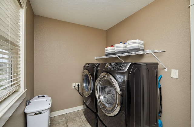 1009 NW Orchard Dr, Ankeny, IA 50023 - washroom featuring baseboards, laundry area, and washer and clothes dryer