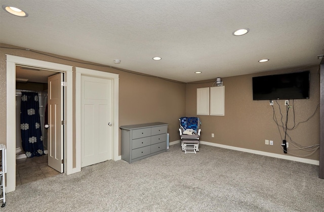 1009 NW Orchard Dr, Ankeny, IA 50023 - unfurnished room with baseboards, carpet, recessed lighting, and a textured ceiling