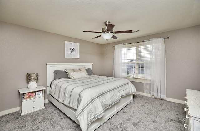 1009 NW Orchard Dr, Ankeny, IA 50023 - carpeted bedroom with baseboards and ceiling fan