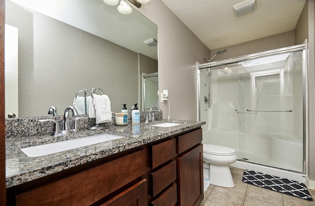 1009 NW Orchard Dr, Ankeny, IA 50023 - full bathroom with toilet, a sink, tile patterned flooring, and a stall shower