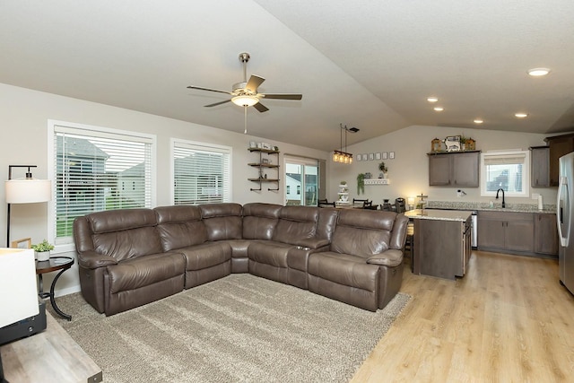living area featuring recessed lighting, a ceiling fan, light wood-style flooring, and lofted ceiling