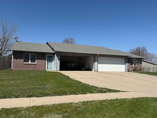 ranch-style house with fence, an attached garage, driveway, and a front lawn