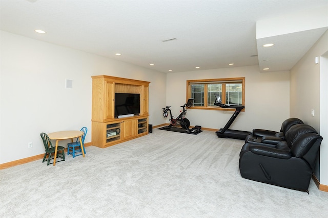 exercise room with baseboards, carpet flooring, and recessed lighting