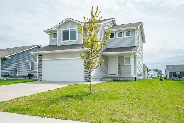 view of front of home with a garage, a front yard, a shingled roof, central AC unit, and driveway