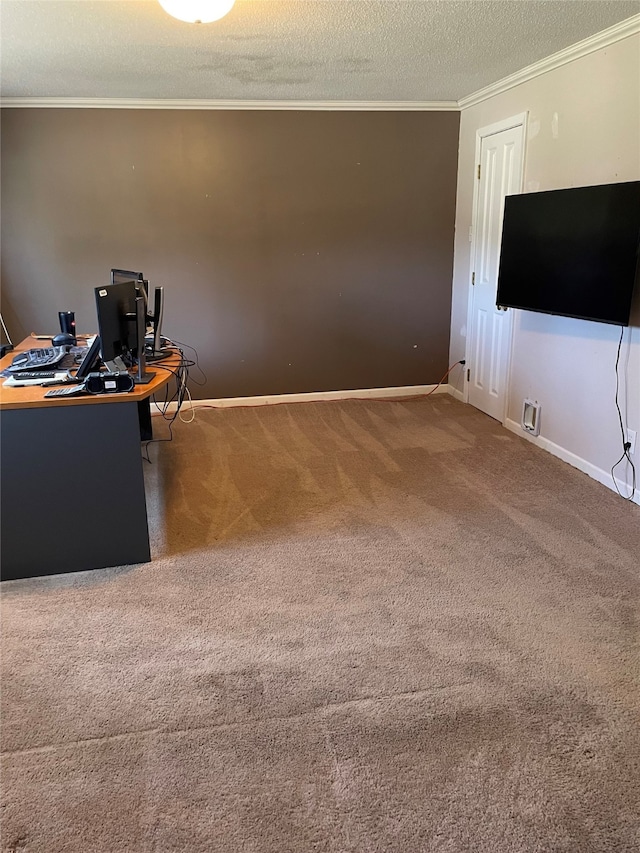 unfurnished office with baseboards, ornamental molding, a textured ceiling, and carpet flooring