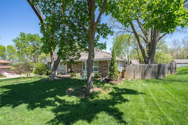 view of yard with fence
