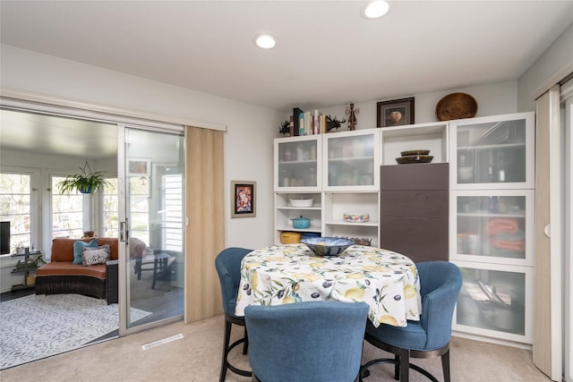 1233 24th St, West Des Moines, IA 50266 - dining area with light colored carpet and recessed lighting