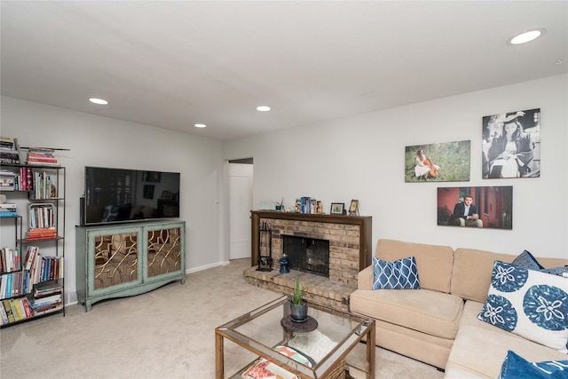 carpeted living room featuring recessed lighting, baseboards, and a fireplace