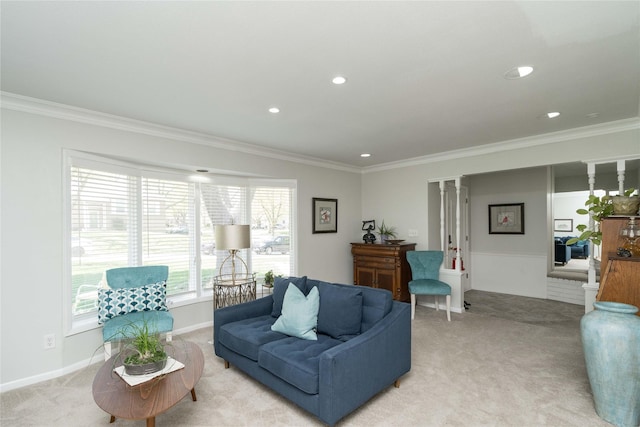 living room with crown molding, recessed lighting, and light carpet