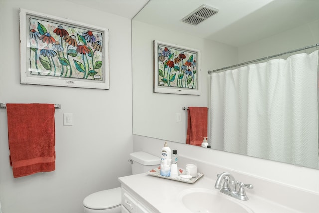 1233 24th St, West Des Moines, IA 50266 - full bath featuring toilet, vanity, and a shower with curtain