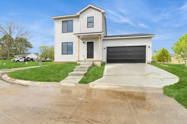 view of front of property with board and batten siding, an attached garage, concrete driveway, and a front lawn