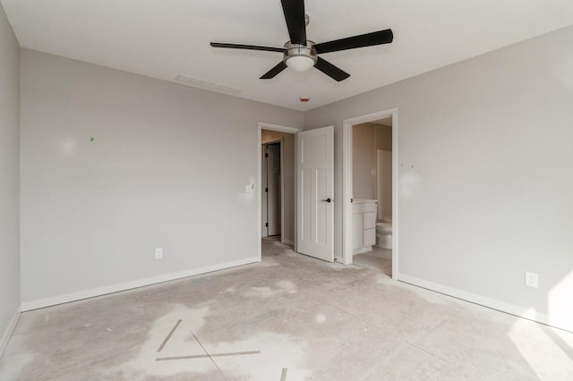 unfurnished bedroom featuring visible vents, baseboards, ceiling fan, concrete floors, and ensuite bath