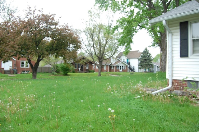 view of yard featuring a residential view