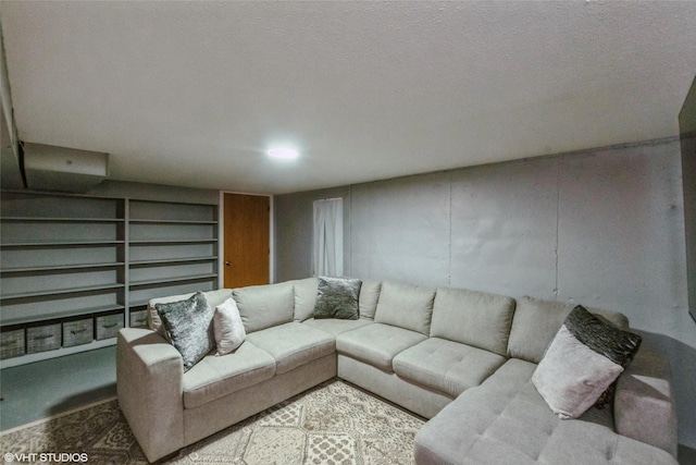 living area featuring built in shelves