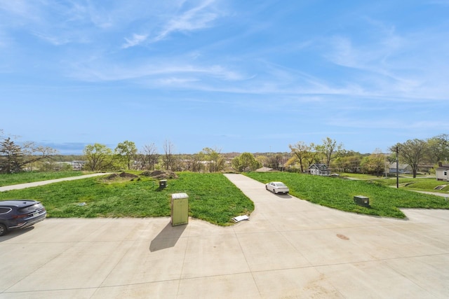 view of community featuring a yard