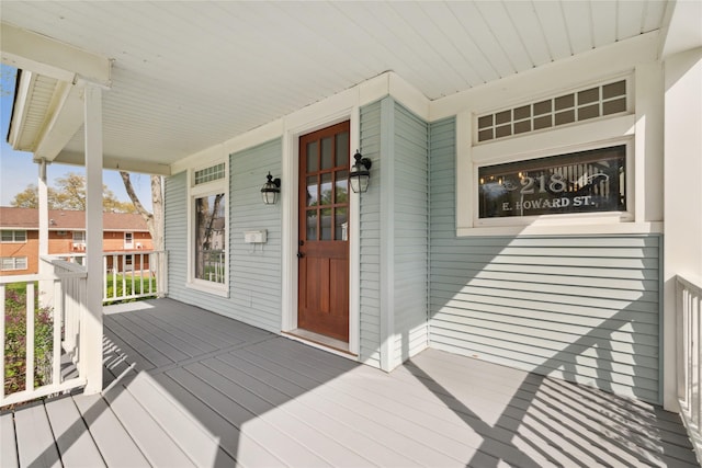 wooden terrace featuring a porch
