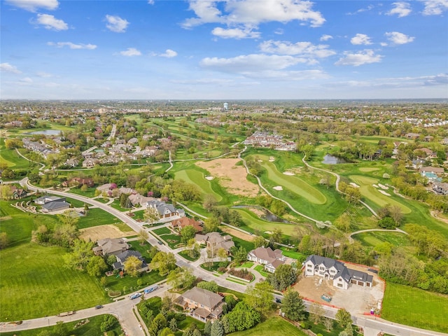 bird's eye view featuring a residential view, view of golf course, and a water view