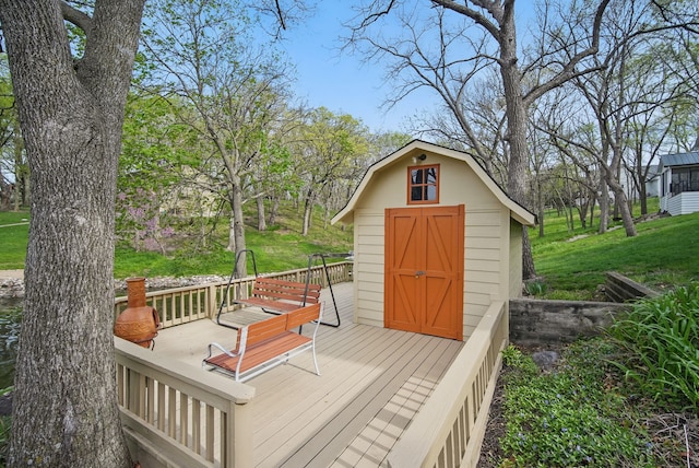 4715 Johnson Pt, Panora, IA 50216 - wooden terrace featuring a storage shed and a yard
