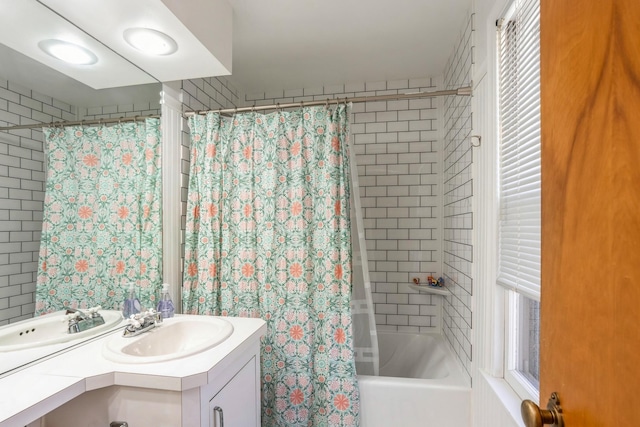full bathroom with vanity and shower / bath combination with curtain