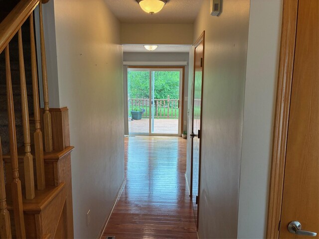 108 S 46th St, West Des Moines, IA 50265 - hallway featuring baseboards and hardwood / wood-style flooring