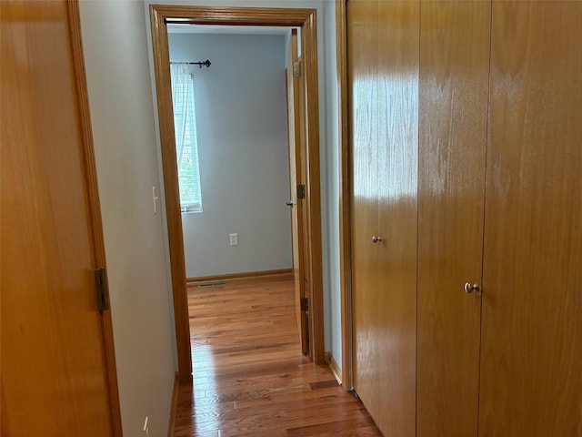 108 S 46th St, West Des Moines, IA 50265 - corridor featuring light wood finished floors and baseboards