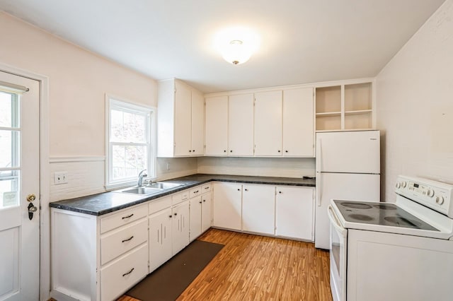 kitchen with dark countertops, open shelves, a sink, light wood-type flooring, and white electric stove