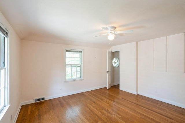 348 49th St, Des Moines, IA 50312 - empty room with light wood finished floors and a ceiling fan