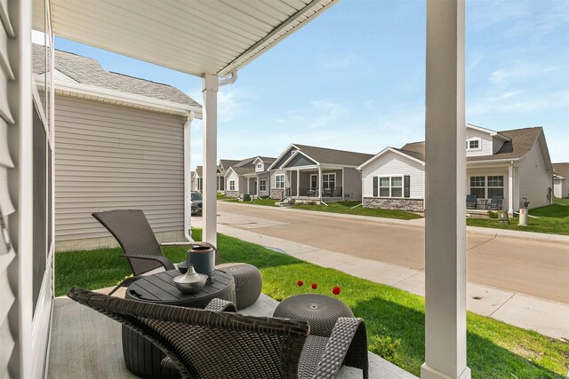 2601 NW 30th Ln, Ankeny, IA 50023 - view of patio / terrace featuring covered porch and a residential view