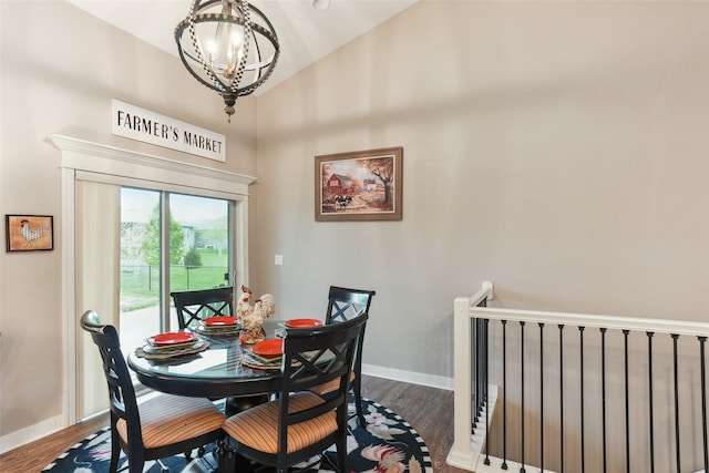 2006 NE 16th St, Ankeny, IA 50021 - dining room featuring vaulted ceiling, wood finished floors, baseboards, a notable chandelier, and radiator