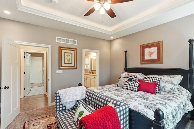 2006 NE 16th St, Ankeny, IA 50021 - bedroom featuring visible vents, recessed lighting, and a tray ceiling