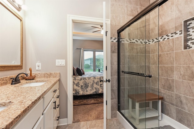 2006 NE 16th St, Ankeny, IA 50021 - ensuite bathroom featuring ensuite bathroom, a ceiling fan, vanity, and a shower stall