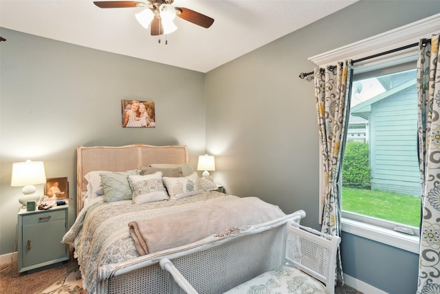 2006 NE 16th St, Ankeny, IA 50021 - bedroom with baseboards, ceiling fan, and carpet flooring