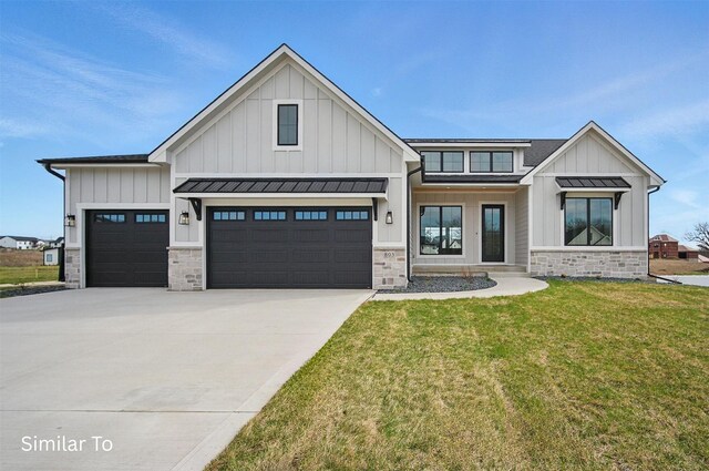 7325 NW Beaver Dr, Johnston, IA 50131 - modern farmhouse featuring an attached garage, a front lawn, stone siding, board and batten siding, and concrete driveway