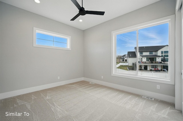 7325 NW Beaver Dr, Johnston, IA 50131 - spare room featuring visible vents, a ceiling fan, baseboards, recessed lighting, and carpet flooring