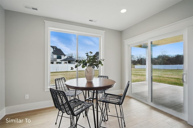 7325 NW Beaver Dr, Johnston, IA 50131 - dining space with a wealth of natural light, recessed lighting, light wood-style flooring, and visible vents