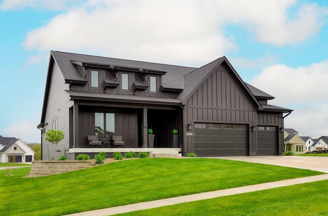 modern farmhouse style home with a garage, a front yard, a shingled roof, board and batten siding, and concrete driveway