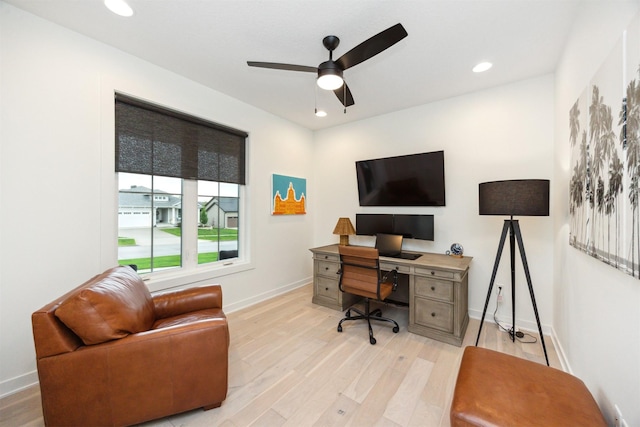 office area with baseboards, a ceiling fan, light wood finished floors, and recessed lighting