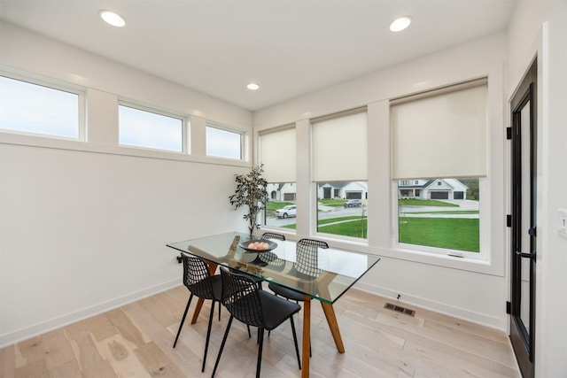 dining area featuring visible vents, recessed lighting, light wood-style flooring, and baseboards